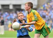 31 August 2014; Cian Hartin, St Patrick's N.S, Gowna, Cavan, representing Donegal, in action against Darragh O'Sullivan Connell, Murrintown N.S, Wexford, representing Dublin, during the INTO/RESPECT Exhibition GoGames. Croke Park, Dublin. Picture credit: Ramsey Cardy / SPORTSFILE