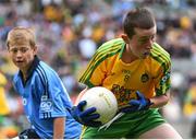 31 August 2014; Jack Dardi's, Scoil Cholmcille, Meath, representing Donegal, in action against Darragh O'Sullivan Connell, Murrintown N.S, Wexford, representing Dublin, during the INTO/RESPECT Exhibition GoGames. Croke Park, Dublin. Picture credit: Ramsey Cardy / SPORTSFILE