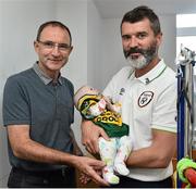 2 September 2014; Republic of Ireland manager Martin O'Neill, left, and assistant manager Roy Keane with 3 month old Realtaoin O'Lone, from Tyrrelstown, Co. Dublin, during a visit to Temple Street Childrens Hospital, Dublin. Picture credit: David Maher / SPORTSFILE