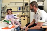 2 September 2014; Republic of Ireland assistant manager Roy Keane with Amber O'Halloran, age 5, from Booterstown, Co. Dublin, during a visit to Temple Street Childrens Hospital, Dublin. Picture credit: David Maher / SPORTSFILE
