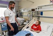 2 September 2014; Republic of Ireland assistant manager Roy Keane with Ella Larkin, age 10, from Glasnevin, Co. Dublin, during a visit to Temple Street Childrens Hospital, Dublin. Picture credit: David Maher / SPORTSFILE