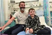 2 September 2014; Republic of Ireland assistant manager Roy Keane with Joshua Jones, age 9, from Rush, Co. Dublin, during a visit to Temple Street Childrens Hospital, Dublin. Picture credit: David Maher / SPORTSFILE