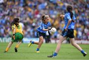 31 August 2014; Niamh Lydon, Scoil Naomh Colmcille, Durrow N.S, Offaly, representing Dublin, in action against Louise Ní Dochartaigh, Scoil na Carraige, Donegal, representing Donegal, during the INTO/RESPECT Exhibition GoGames. Croke Park, Dublin. Picture credit: Brendan Moran / SPORTSFILE