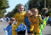 31 August 2014; Dublin and Donegal supporters and cousins, left to right, Katie Sharkey, aged 4, from Cloghran, Co. Dublin, Ryan McGrath, aged 11, from Lifford, Co. Donegal, Xsara Sharkey, aged 9, and Megan McGrath, aged 8, on their way to the game. GAA Football All Ireland Senior Championship Semi-Final, Dublin v Donegal, Croke Park, Dublin. Picture credit: Dáire Brennan / SPORTSFILE