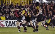 5 January 2007; Ian Dowling, Munster, is tackled by Ceri Sweeney, Newport Gwent Dragons. Magners League, Newport Gwent Dragons v Munster, Rodney Parade, Newport, Gwent, Wales. Picture credit: Pat Murphy / SPORTSFILE