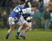7 January 2007; Damien Hendy, Kildare, is tackled by Brian McCormack, Laois. O'Byrne Cup, First Round, Laois v Kildare, McCann Park, Portarlington, Co. Laois. Picture credit: Matt Browne / SPORTSFILE