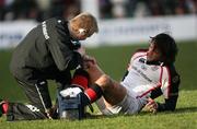 31 December 2006; Ulster's Neil Best gets treatment from team physiotherapist Gareth Robinson. Magners League, Leinster v Ulster, Lansdowne Road, Dublin. Picture credit: Oliver McVeigh / SPORTSFILE