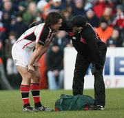 31 December 2006; Ulster's Isaac Boss gets treatment from team doctor Dr.David Irwin. Magners League, Leinster v Ulster, Lansdowne Road, Dublin. Picture credit: Oliver McVeigh / SPORTSFILE