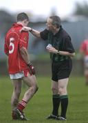 7 January 2007; Referee Noel Cocoman checks the number of Louth's John O'Brien. O'Byrne Cup, First Round, Louth v Meath, Gaelic Grounds, Drogheda, Co. Louth. Picture credit: Brian Lawless / SPORTSFILE
