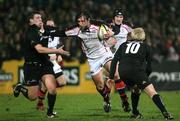 26 December 2006; Neil Best, Ulster, is tackled by Connacht's Brent Sturgess and Mark McHugh. Magners League, Ulster v Connacht, Ravenhill Park, Belfast. Picture credit: Oliver McVeigh / SPORTSFILE