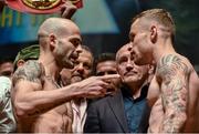 5 September 2014; Kiko Martinez, left, and Carl Frampton face-off during the weigh-in for the IBF super-bantamweight World title fight. Titanic Showdown Weigh In, Ulster Hall, Belfast, Co. Antrim. Picture credit: Ramsey Cardy / SPORTSFILE