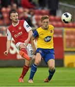5 September 2014; Kenny Browne, St Patrick's Athletic, in action against John Mountney, Dundalk. SSE Airtricity League Premier Division, St Patrick's Athletic v Dundalk, Richmond Park, Dublin. Picture credit: Paul Mohan / SPORTSFILE