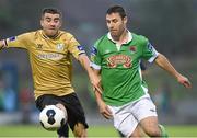 5 September 2014; Mark O'Sullivan, Cork City, in action against Robert Bayly, Shamrock Rovers. SSE Airtricity League Premier Division, Cork City v Shamrock Rovers, Turners Cross, Cork. Picture credit: Matt Browne / SPORTSFILE