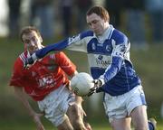 14 January 2007; Brian McCormack, Laois, in action against, Nicky McDonnell, Louth. O'Byrne Cup Quarter-Final, Laois v Louth, McCann Park, Portarlington, Co. Laois. Picture credit: Brian Lawless / SPORTSFILE