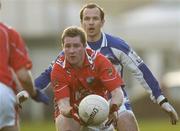 14 January 2007; Alan Page, Louth, in action against, Tom Kelly, Laois. O'Byrne Cup Quarter-Final, Laois v Louth, McCann Park, Portarlington, Co. Laois. Picture credit: Brian Lawless / SPORTSFILE