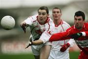 14 January 2007; Paul Rouse, Tyrone, in action against Kevin McCann, Derry. McKenna Cup, Section B, 2nd Round, Tyrone v Derry, Healy Park, Omagh, Co Tyrone. Picture credit: Oliver McVeigh / SPORTSFILE