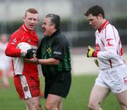 14 January 2007; Referee Brian Crowe shares a joke with Fergal Doherty, Derry, after blowing him up for a foul. McKenna Cup, Section B, 2nd Round, Tyrone v Derry, Healy Park, Omagh, Co Tyrone. Picture credit: Oliver McVeigh / SPORTSFILE