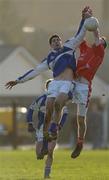 14 January 2007; Brendan Quigley, Laois, in action against, John O'Brien, Louth. O'Byrne Cup Quarter-Final, Laois v Louth, McCann Park, Portarlington, Co. Laois. Picture credit: Brian Lawless / SPORTSFILE