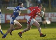 14 January 2007; Ray Finnegan, Louth, in action against, David Murphy, Laois. O'Byrne Cup Quarter-Final, Laois v Louth, McCann Park, Portarlington, Co. Laois. Picture credit: Brian Lawless / SPORTSFILE