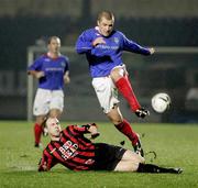 16 January 2007; Aidan O'Kane, Linfield, in action against Ken Doherty, Oxford United Stars. Irish Cup, Round 5, Linfield v Oxford United Stars, Windsor Park, Belfast, Co. Antrim. Picture credit: Russell Pritchard / SPORTSFILE