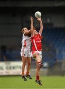 6 September 2014; Annie Walsh, Cork, in action against Niamh Henderson, Armagh. TG4 All-Ireland Ladies Football Senior Championship Semi-Final, Armagh v Cork. Pearse Park, Longford. Photo by Sportsfile