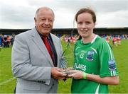 6 September 2014; Sharon Little, Fermanagh, is presented with the Player of the Match by Pat Quill, President, Ladies Gaelic Football. TG4 All-Ireland Ladies Football Intermediate Championship Semi-Final, Fermanagh v Roscommon. Pearse Park, Longford. Photo by Sportsfile
