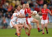 6 September 2014; Nollaig Cleary, Cork, in action against Mairead Tennyson, Armagh. TG4 All-Ireland Ladies Football Senior Championship Semi-Final, Armagh v Cork. Pearse Park, Longford. Photo by Sportsfile