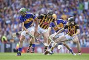 7 September 2014; James Woodlock and Shane McGrath, Tipperary, contest the first throw in with Richie Hogan and Conor Fogarty, Kilkenny. GAA Hurling All Ireland Senior Championship Final, Kilkenny v Tipperary. Croke Park, Dublin. Picture credit: Brendan Moran / SPORTSFILE
