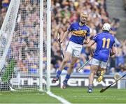 7 September 2014; Tipperary's Seamus Callanan, left, celebrates after team-mate Patrick Maher, 11, scored their side's first goal. GAA Hurling All Ireland Senior Championship Final, Kilkenny v Tipperary. Croke Park, Dublin. Picture credit: Stephen McCarthy / SPORTSFILE