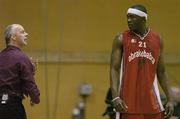 14 January 2007; Abrakebabra Tigers coach Dave Falvey discusses a play with Wlder Auguste. Men's Superleague National Cup Semi-Final, St Vincent's v Abrakebabra Tigers, National Basketball Arena, Tallaght, Dublin. Picture credit: Brendan Moran / SPORTSFILE