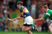13 April 1997; Aidan Flanagan of Tipperary in action against Stephen McDonagh of Limerick during the National Hurling League Division 1 match between Limerick v Tipperary at the Gaelic Grounds in Limerick. Photo by Brendan Moran/Sportsfile