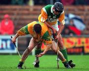 18 May 1997; Anthony O'Neill of Meath in action against Johnny Dooley of Offaly during the Leinster Senior Hurling Championship Preliminary Round match between Offaly and Meath at Cusack Park in Mullingar. Photo by Ray McManus/Sportsfile
