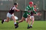 16 February 1997; Brian Lohan of Wolfe Tones breaks away from the challenges of Rory McNaughton, left and Conor McCambridge of Ruairí Óg Cushendall during the All-Ireland Senior Club Hurling Championship Semi-Final between Ruairí Óg Cushendall and Wolfe Tones at Parnell Park in Dublin. Photo by Brendan Moran/Sportsfile