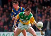 11 May 1997; Ciaran McManus of Offaly in action against Pauric Farrell of Longford during the Leinster GAA Senior Football Championship First Round match between Offaly and Longford at O'Connor Park, Tullamore. Photo by David Maher/Sportsfile