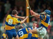 10 May 1997; Ollie Baker, 8, of Clare battles for possession against Colm Bonner of Tipperary during the National Hurling League Division 1 match between Clare and Tipperary at Cusack Park in Ennis. Photo by Ray McManus/Sportsfile