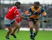 8 June 1997; Conor Clancy of Clare in action against John O'Driscoll of Cork during the GAA Munster Senior Hurling Championship Semi-Final between Clare and Cork at the Gaelic Grounds in Limerick. Photo by Ray McManus/Sportsfile