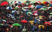 18 May 1997; Supporters brave the wet conditions during the Leinster Senior Hurling Championship Preliminary Round match between Offaly and Meath at Cusack Park in Mullingar. Photo by Ray McManus/Sportsfile