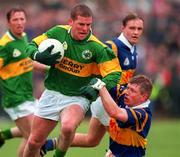 19 May 1996; Dara O'Cinneide of Kerry holds off the challenge of Sean Brett of Tipperary during the Munster Senior Football Championship Quarter-Final between Tipperary and Kerry at Ned Hall Park in Clonmel. Photo by Ray McManus/Sportsfile