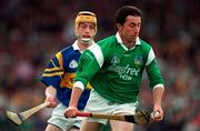 13 April 1997; Declan Nash of Limerick in action against Liam Cahill of Tipperary during the National Hurling League Division 1 match between Limerick v Tipperary at the Gaelic Grounds in Limerick. Photo by Brendan Moran/Sportsfile