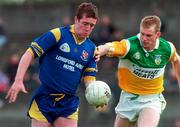 11 May 1997; Enda Barden of Longford in action against Ronan Mooney of Offaly during the Leinster GAA Senior Football Championship First Round match between Offaly and Longford at O'Connor Park, Tullamore. Photo by David Maher/Sportsfile