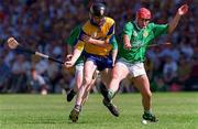 16 June 1996; Frank Lohan of Clare in action against TJ Ryan of Limerick during the Munster GAA Hurling Senior Championship Semi-Final match between Limerick and Clare at Gaelic Grounds in Limerick. Photo by David Maher/Sportsfile