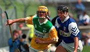 10 May 1997; Ger Oakley of Offaly in action against John O'Sullivan of Laois during the National Hurling League Division 1 match between Offaly and Laois at O'Connor Park, Tullamore. Photo by David Maher/Sportsfile