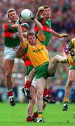 15 September 1996; Jim McGuinness of Meath in action against Colm McMenamon, left, and James Horan of Mayo during the GAA All-Ireland Senior Football Championship Final between Meath and Mayo at Croke Park in Dublin. Photo by Ray McManus/Sportsfile