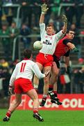 18 May 1997; Jody Gormley of Tyrone in action against Gregory McCartan of Down during the Ulster GAA Football Senior Championship Preliminary Round match between Down and Tyrone at St. Tiernach's Park in Clones. Photo by David Maher/Sportsfile