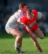 1 February 1997; Joe Cassidy of Derry in action against John Finn of Kildare during the National Football League Division 1 match between Kildare and Derry at St Conleth's Park in Newbridge, Kildare. Photo by Ray McManus/Sportsfile