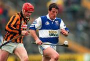 14 April 1996; Joe Dollard of Laois races clear from Michael Phelan of Kilkenny during the National Hurling League Division 1 Quarter-Final between Laois and Kilkenny at Semple Stadium in Thurles. Photo by Ray McManus/Sportsfile
