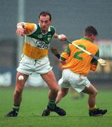 18 May 1997; Joe Dooley of Offaly in action against Anthony O'Neill of Meath during the Leinster Senior Hurling Championship Preliminary Round match between Offaly and Meath at Cusack Park in Mullingar. Photo by Ray McManus/Sportsfile