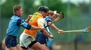 11 May 1997; John Carson of Antrim in action against Ruairi Boland, left, and Barry O'Sullivan of Dublin during the National Hurling League Division 2 match between Dublin and Antrim at Parnell Park in Dublin. Photo by Ray McManus/Sportsfile