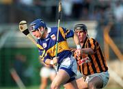 31 May 1997; John Leahy of Tipperary in action against Philip Larkin of Kilkenny during the National Hurling League Division 1 match between Tipperary and Kilkenny in Semple Stadium in Thurles, Co Tipperary. Photo by Ray McManus/Sportsfile