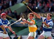 8 June 1997; Kevin Martin of Offaly in action against Niall Rigney, right, of Laois during the GAA Leinster Senior Hurling Championship Quarter-Final between Offaly and Laois in Croke Park in Dublin. Photo by David Maher/Sportsfile